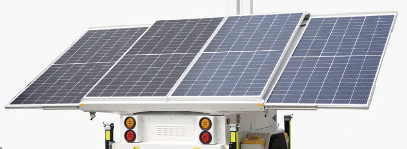 Four solar panels slid out over the trailer body