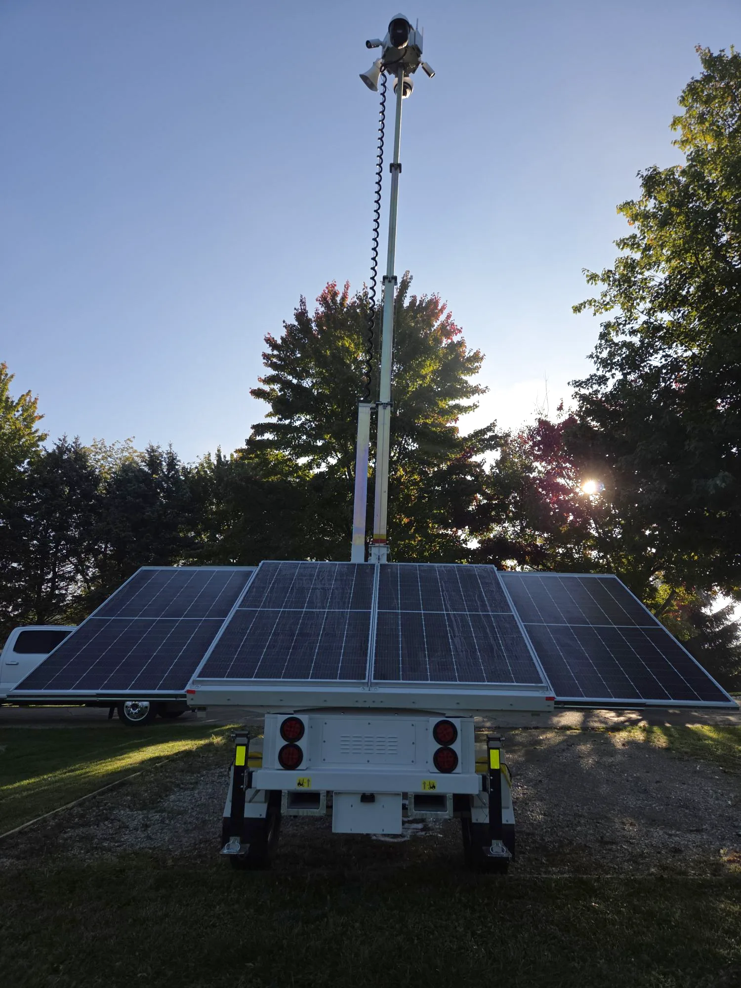 Rear view of the VB4-MST with all four solar panels open and the mast raised